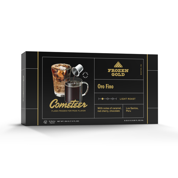 Black coffee box labeled Frozen Gold with two coffee drinks, tasting notes, and origin details on dark background